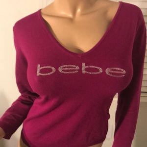 BEBE V-neck sweater; size-Med; gently used